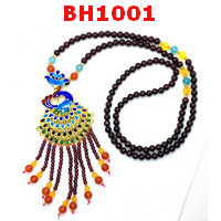 BH1001 : สร้อยคอโกเมน จี้รูปนกยูง