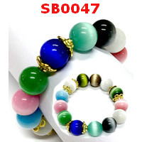 SB0047 : สร้อยข้อมือหินลูกแก้วตาเมวคละสี 